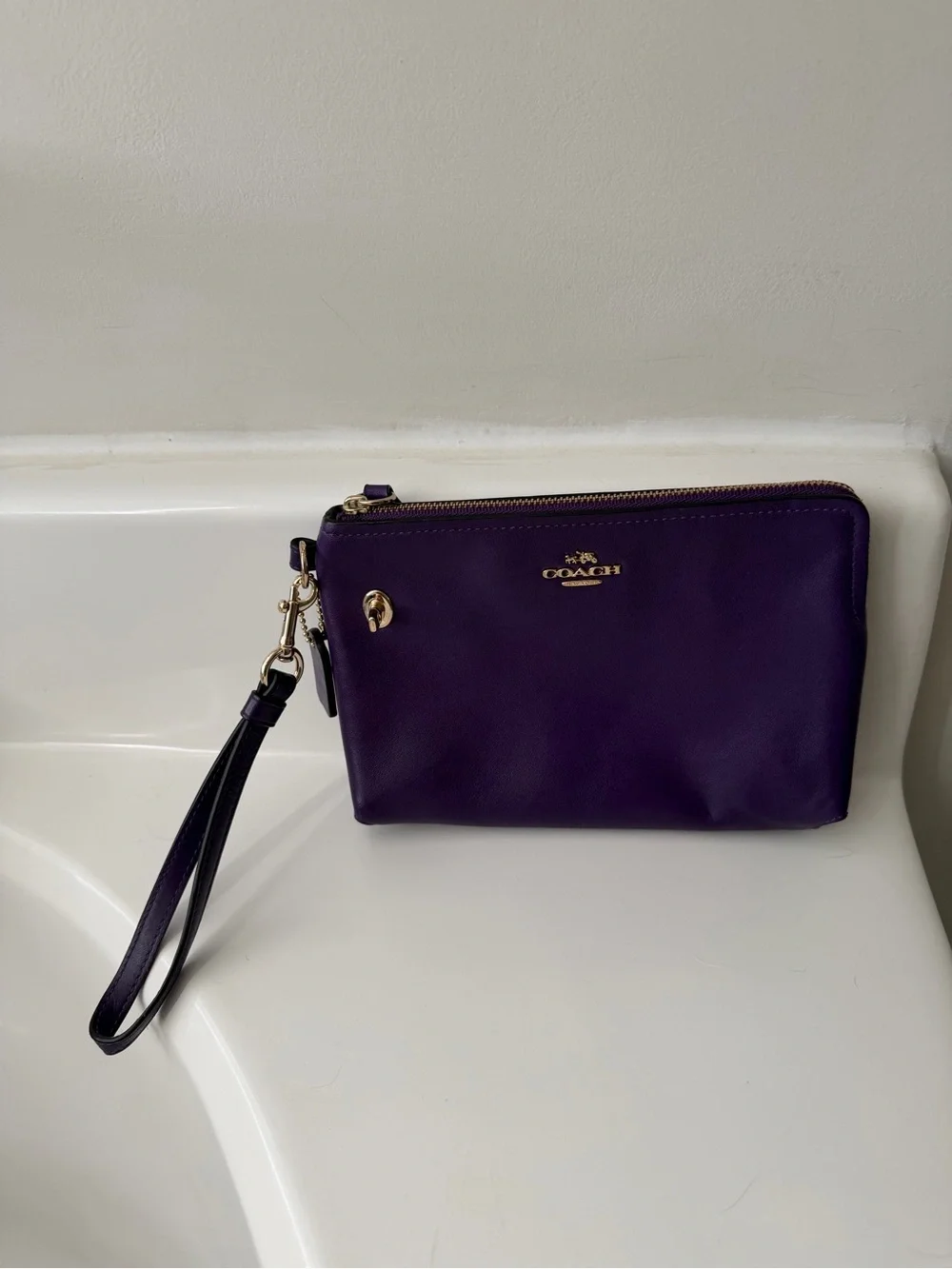 Coach Purple Leather Wristlet with Gold Hardware and Strap